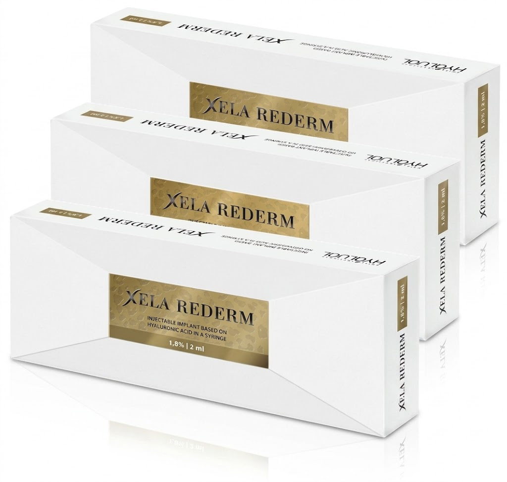 Three white boxes of Xela Rederm cosmetic injectable packaging with a gold label and black text, stacked in a staggered arrangement.